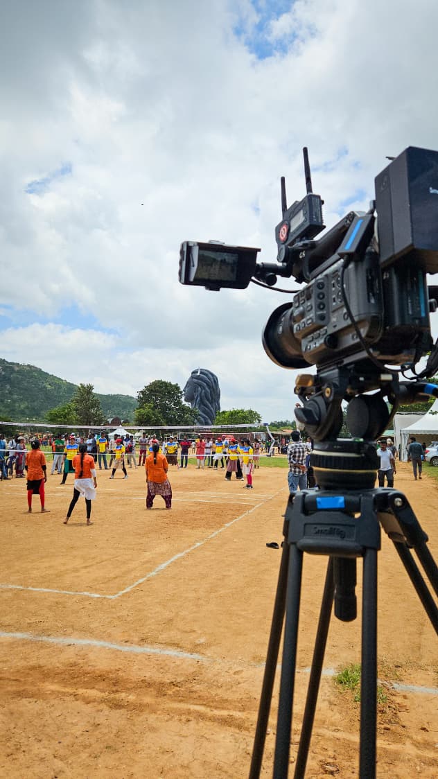 Camera mounted on a tripod overlooking the playing field